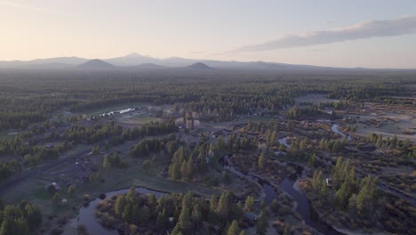 ascending drone shot captures the three sisters mountains in bend, oregon