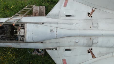 cockpit aerial view above distressed neglected hawker hunter wt804 fighter jet on british pasture farmland