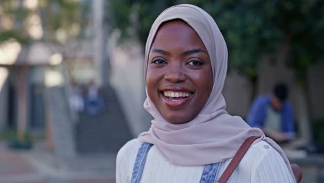 portrait of a smiling woman wearing a hijab