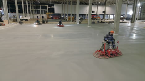 concrete floor pouring and leveling in a large industrial facility