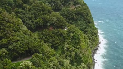 drone aerial cliffside road to hana maui hawaii