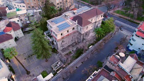 aerial orbit over the bruna palace in the bohemian lastarria neighborhood, residential and touristic district of santiago chile