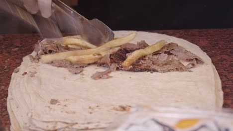 preparing turkish doner kebab