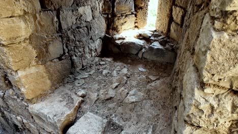 A-close-up-view-of-the-stone-floor-inside-the-Genoese-fortress-in-Feodosia,-Russia