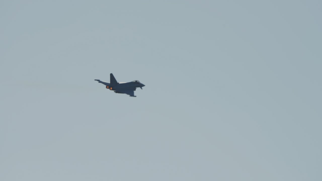 Eurofighter Typhoon Fighter Jet Flying in Clear Blue Sky