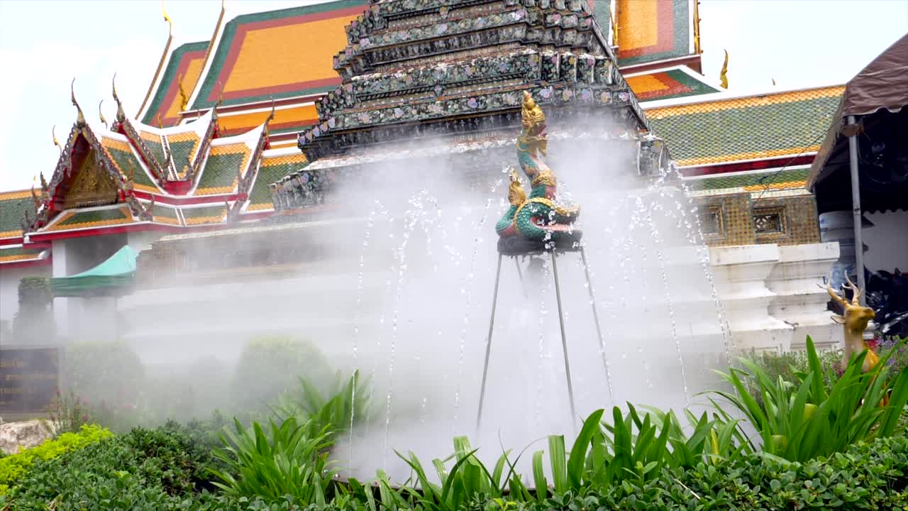 Serene Temple Fountain with Mist