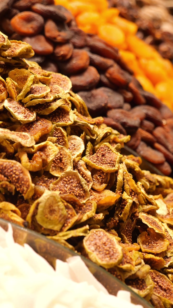 Close-up of Dried Figs and Apricots on Display at a Market