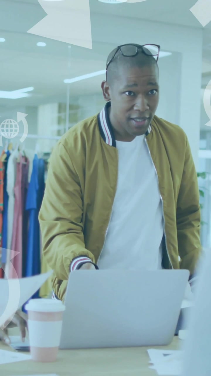 Animation of globe icons and data processing over diverse business people in office