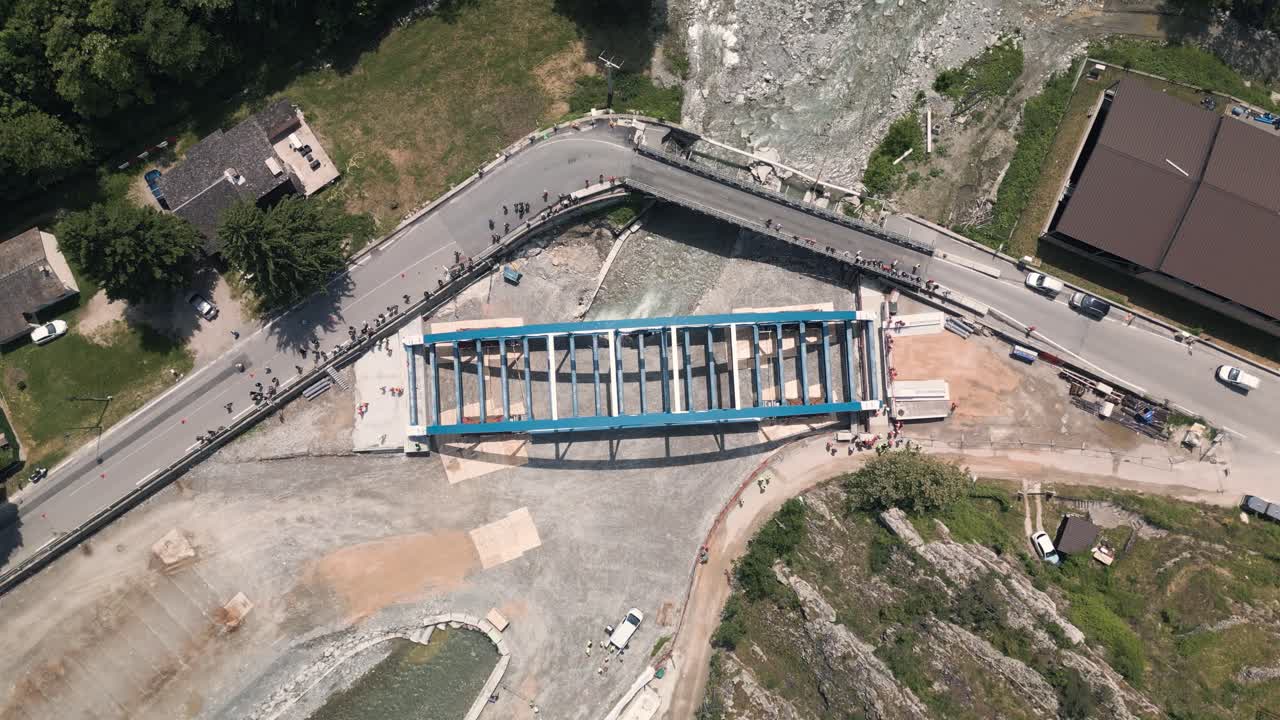 Bridge rigging on a construction site in tende, south of france, during the day, aerial view