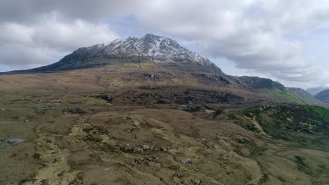 aerial tracking backwards from the majestic ben hope, in sutherland, scotland