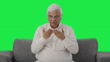 Sick-Indian-old-man-suffering-from-hairfall-Green-screen