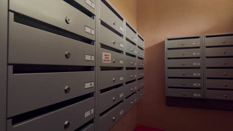 metal stacks of letterbox and mailbox in retro soviet apartment