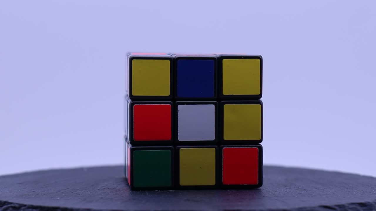 Rubik's cube puzzle rotating on a turntable