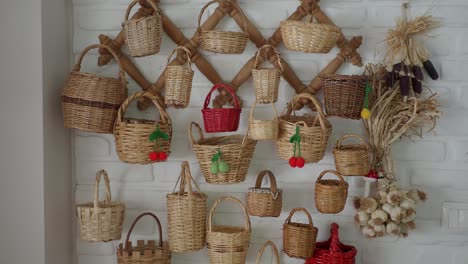 wicker baskets on a white brick wall