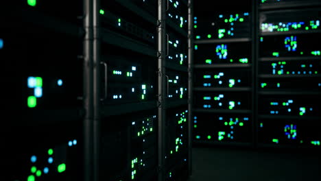 digital data storage facility displaying server racks at night