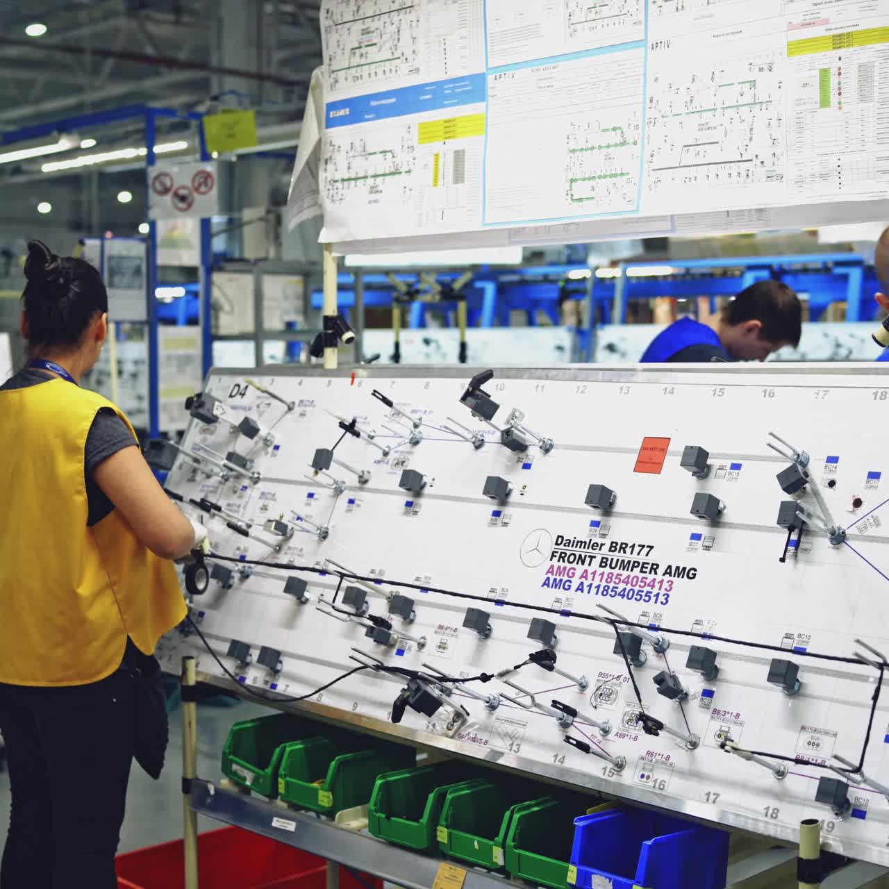 Woman working on production line