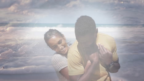 animation of happy african american couple having fun at beach over sea