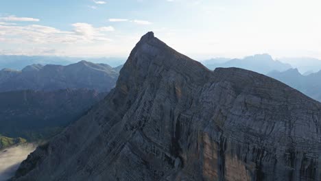 as a testament to the power of time and erosion, the heiligkreizkofel of val badia, with its formidable structure and textured surfaces, commands attention and reverence from every vantage point