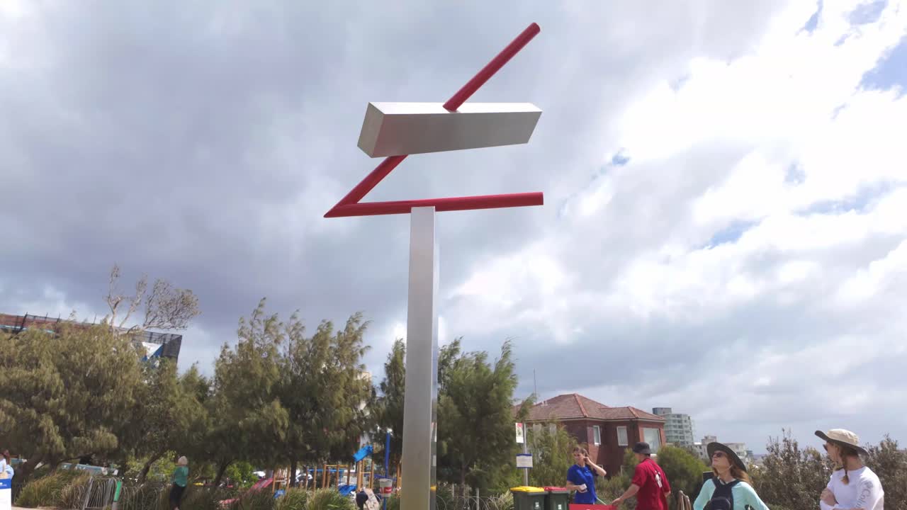 Cycle 90 degree Wind of the Sea by Japanese artist Kaoru Matsumoto captures the essence of wind at Scultpure by the Sea Bondi. Camera tilting up.