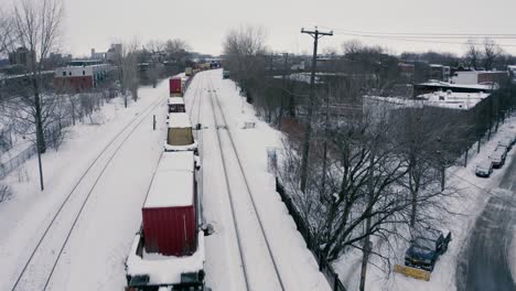 4k winter city train pan down drone sequence_002