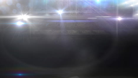 animación de luces en movimiento borrosas y puntos de luz bokeh en un estadio deportivo iluminado