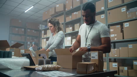 warehouse workers packing orders