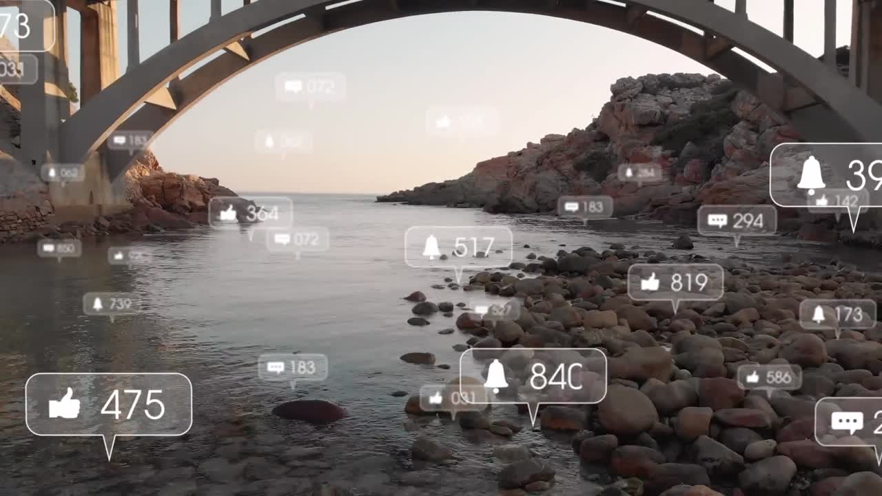 animación de iconos de las redes sociales y puente, orilla rocosa con paisaje marítimo.