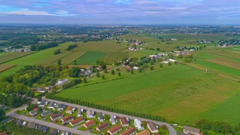 A-High-Altitude-View-of-a-Mobile,-Manufactured,-Modular-Home-Park-and-Farmlands