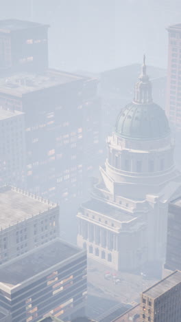 aerial view of a city in the fog