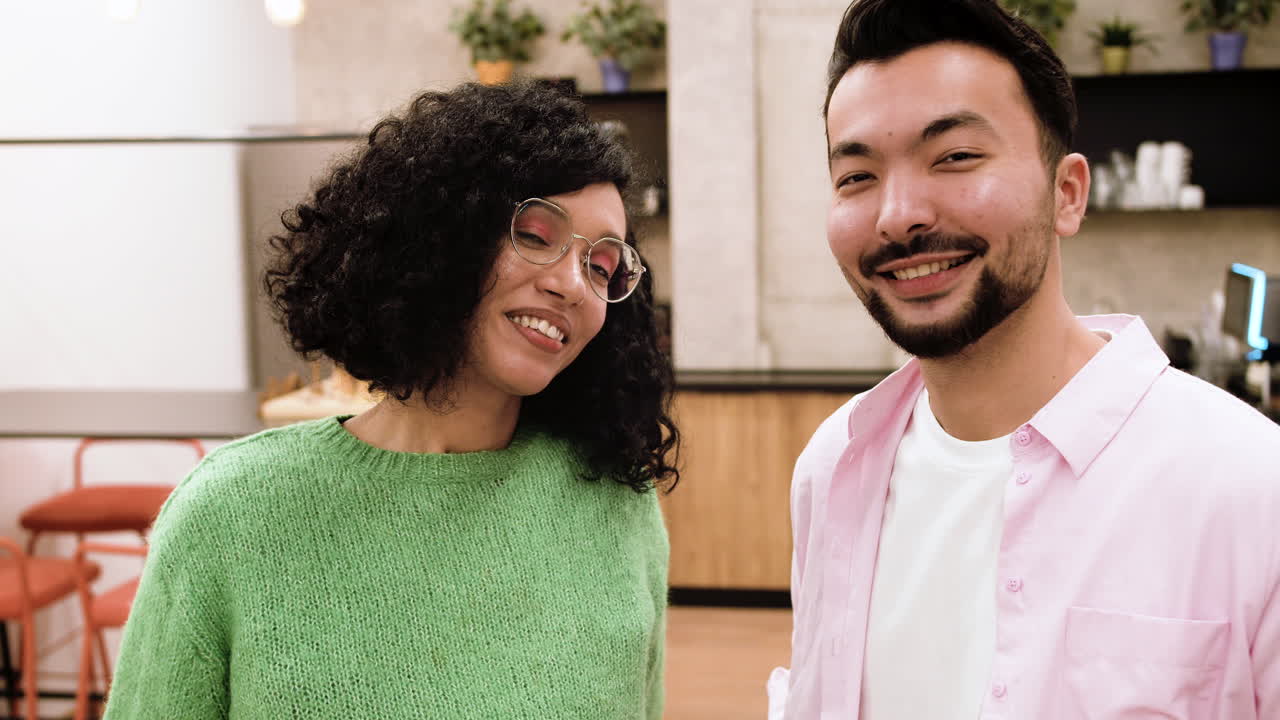Friends posing indoors