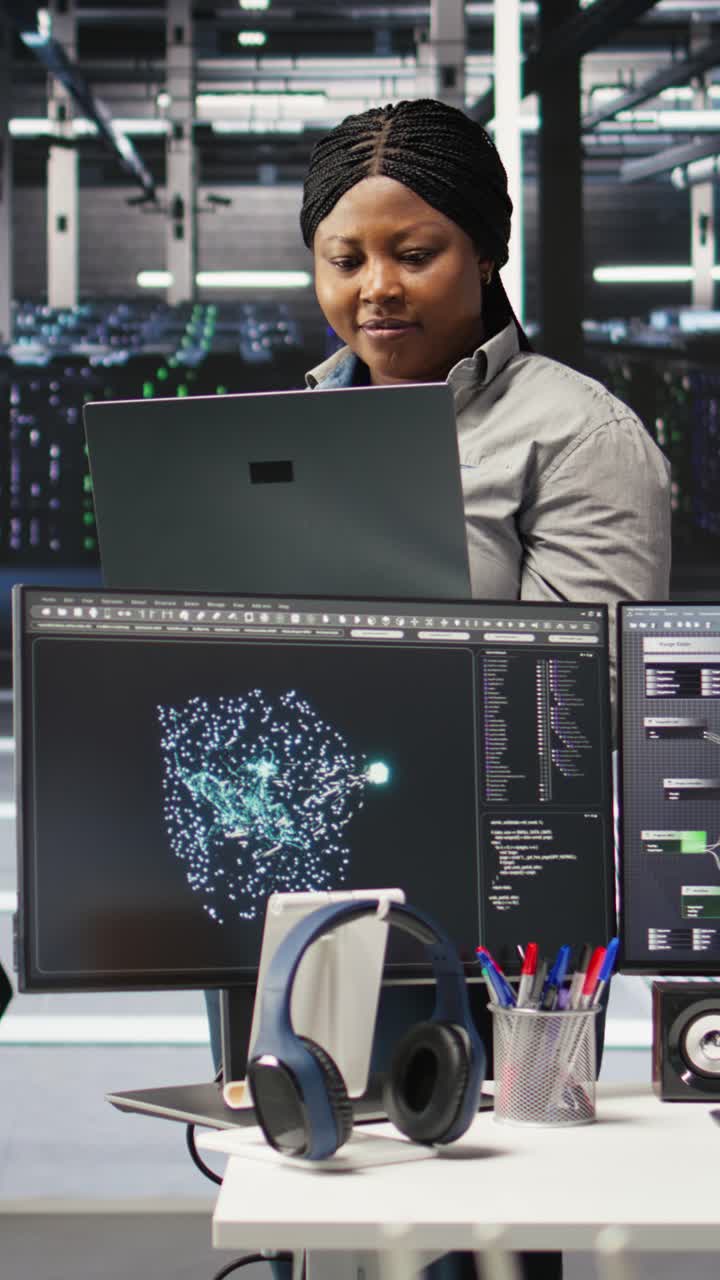Vertical Video Cheerful Data Center Employee Using Node Tree Software To Analyze Datasets