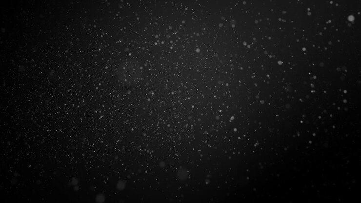 Animation of falling snow over dark background