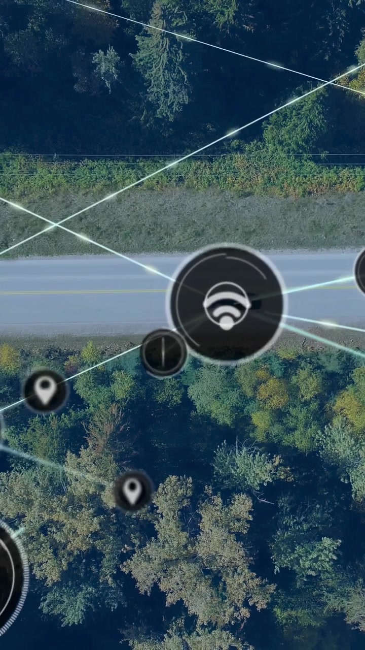 Video vertical: HUD apareciendo sobre la carretera, nodo central pulsando, pines descendiendo y formando una malla
