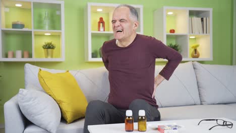 Elderly-man-with-back,-waist-and-knee-pain.-Aging-problems.