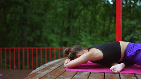 Woman Practicing Yoga Outdoors
