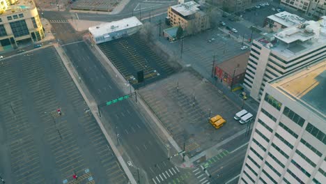 Aerial-view-of-downtown-Denver-showing-empty-streets-and-parking-lot-due-to-corona-virus