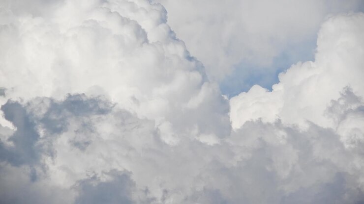 Massive Cumulonimbus clouds forming and moving up high in the sky time lapse, very beautiful dense and thick formations in south africa