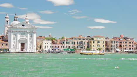 Chiesa-del-Santissimo-Redentore-with-turquoise-sea-in-slow-motion