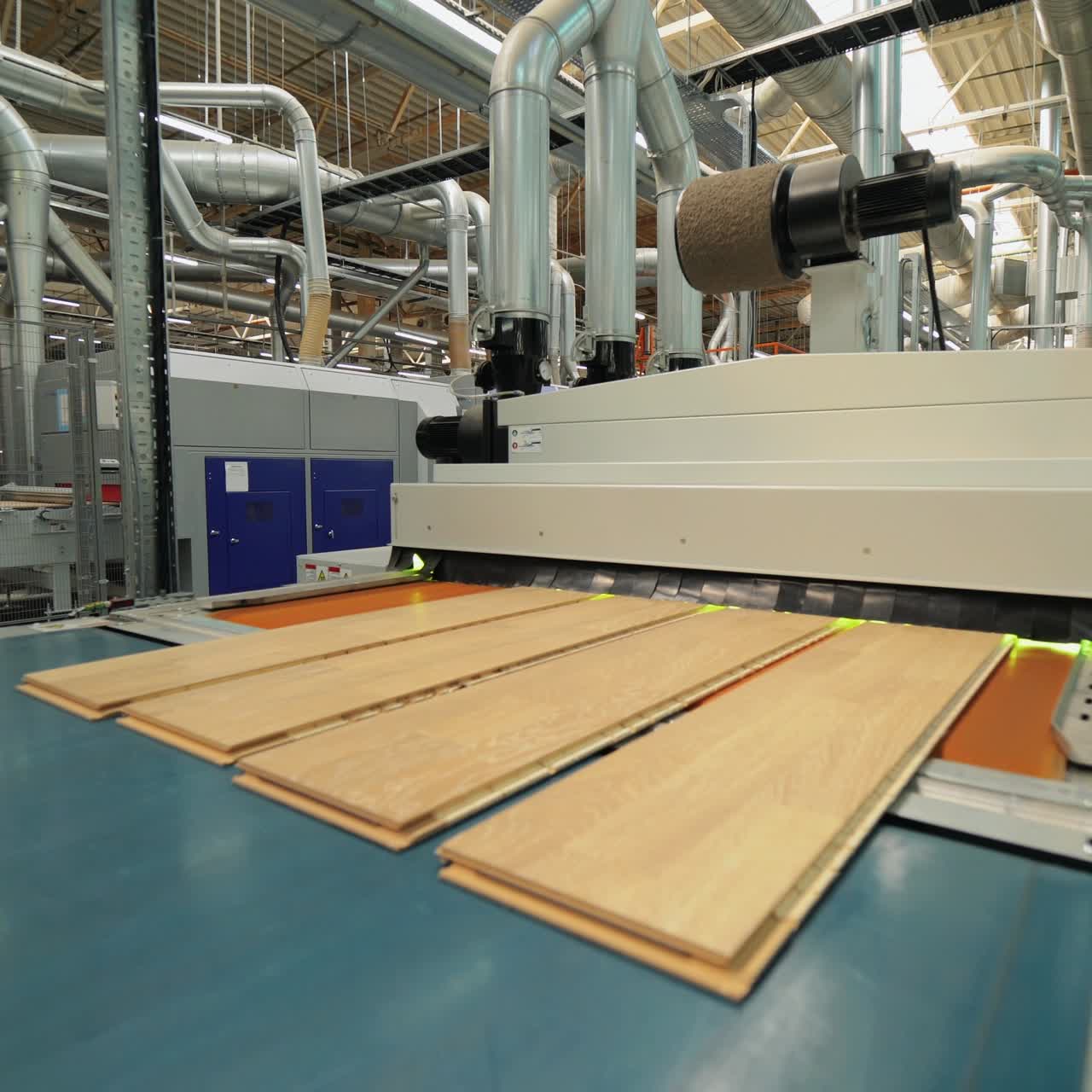 Manufacture of flooring, parquet processing. Modern industrial factory