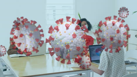 animation of floating covid-19 cells with colleagues in office wearing face masks