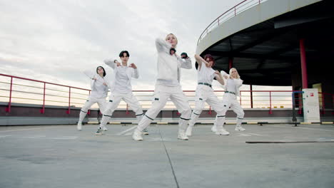 Female-K-Pop-group-dancing-and-performing