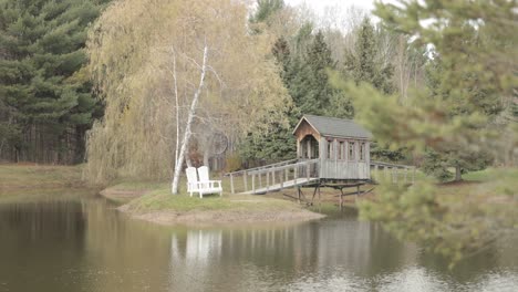 beautiful landscape at the bean town ranch near ottawa that includes a island and a old wooden bridge