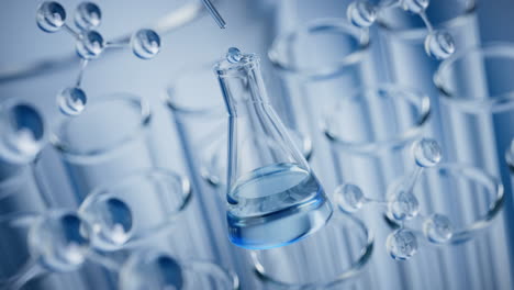 closeup of a flask with blue liquid being filled by a dropper, surrounded by test tubes and molecules