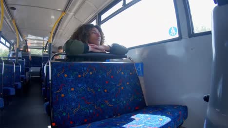 Woman-looking-window-on-a-bus-4k