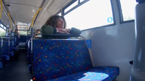 woman looking window on a bus 4k