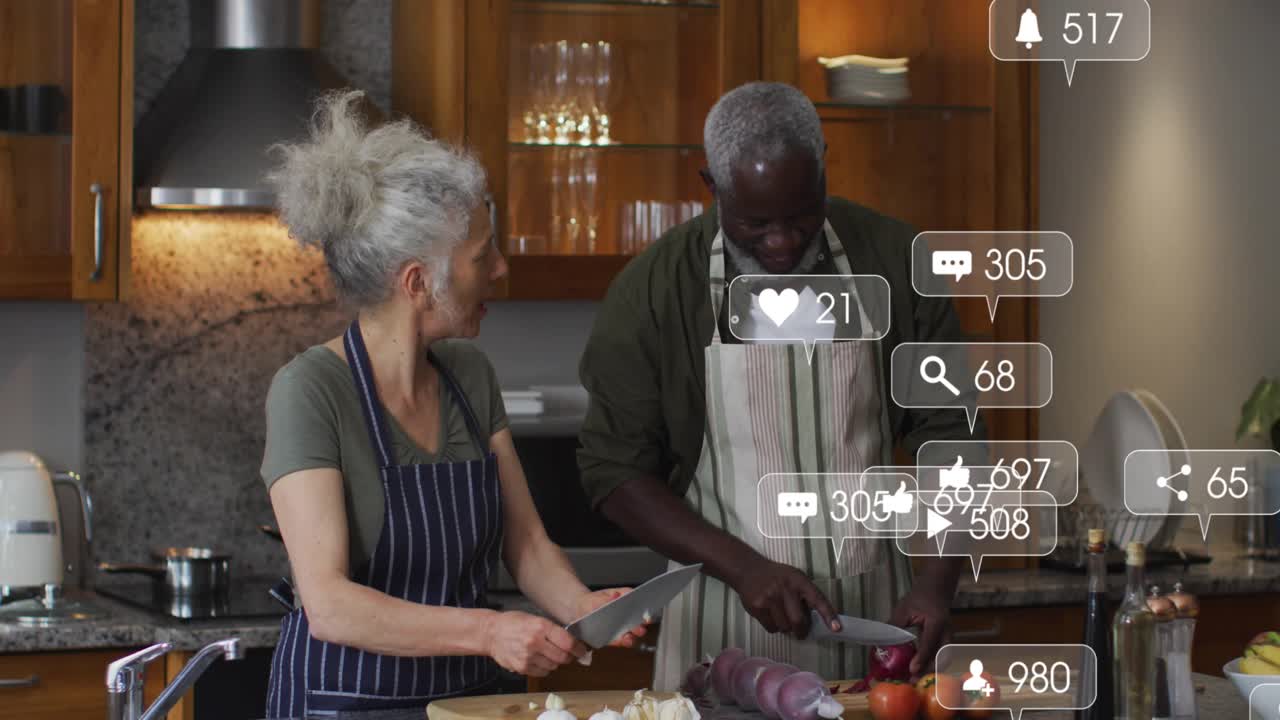 Senior woman and man chopping food causing floating social media marketing icons tracking growth