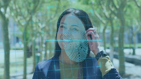 Biometric-finger-scanner-and-security-padlock-icon-against-african-american-woman-smiling