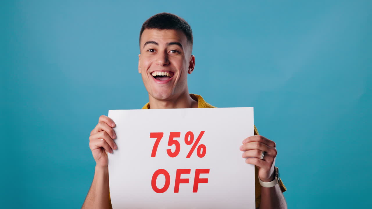 Man holding a 75% off sign