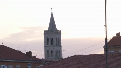 old town zadar with red rooftops and church tower in evening light, croatia summer