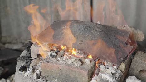 metal plate being heated in a forge